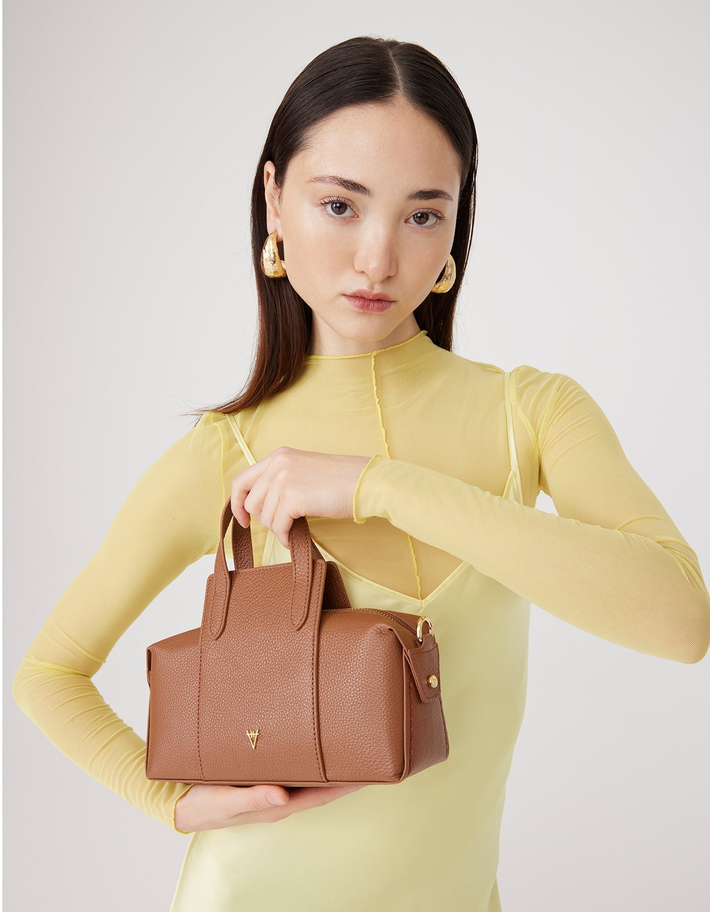 Onsra Cylinder Shoulder Bag