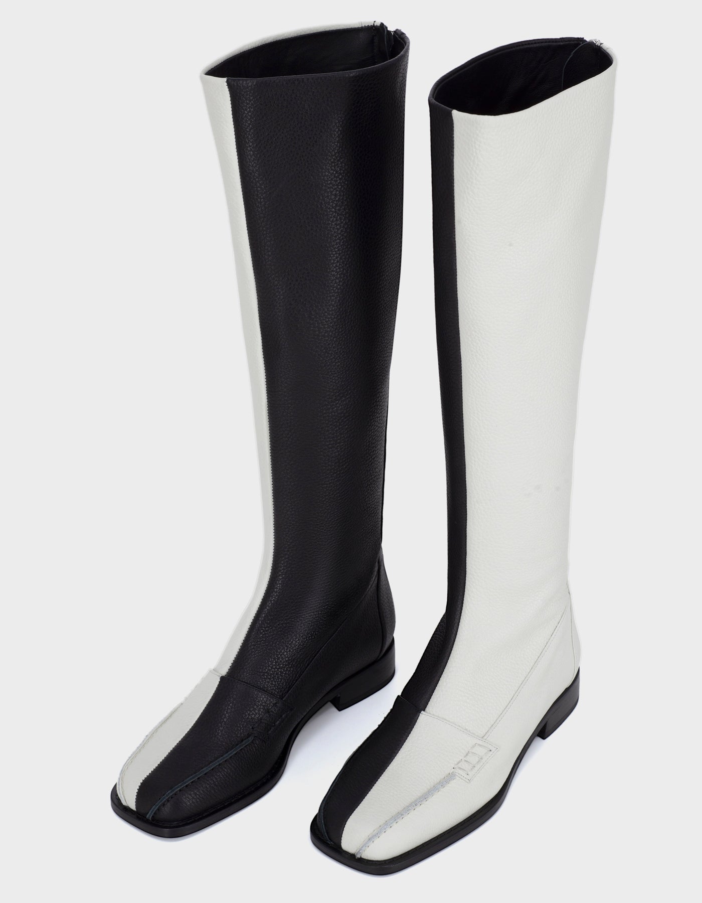 Black and 2025 white knee boots